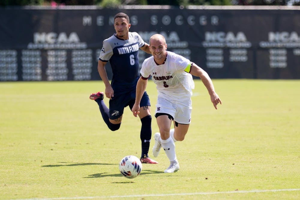 <p>FILE — Then-sophomore midfielder Mika Habel sprints away from his opponent after capturing the ball at Stone Stadium on Aug. 25, 2024.</p>