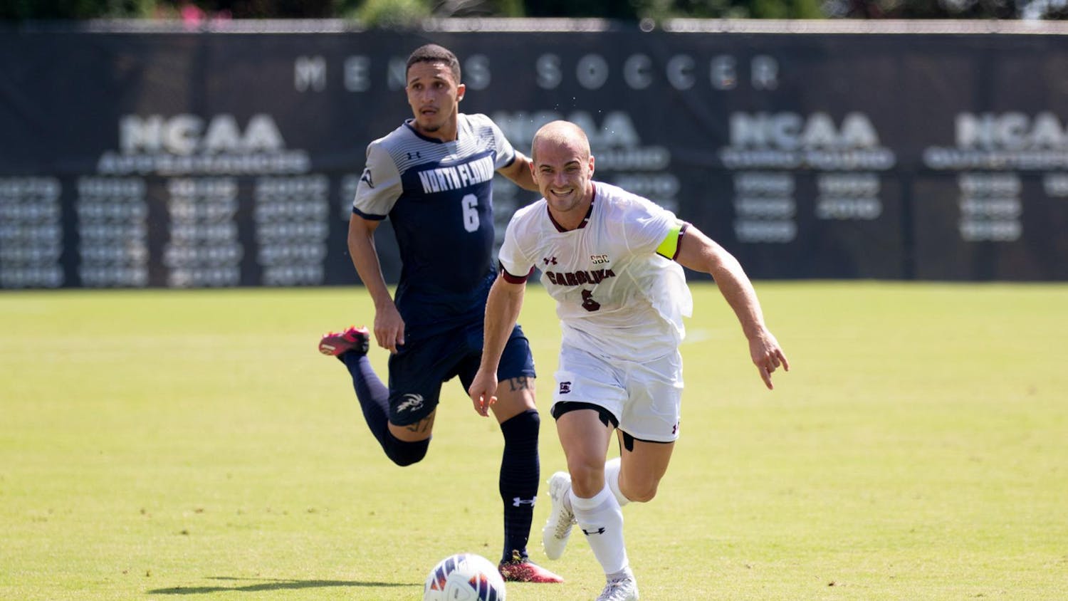 FILE — Then-sophomore midfielder Mika Habel sprints away from his opponent after capturing the ball at Stone Stadium on Aug. 25, 2024.
