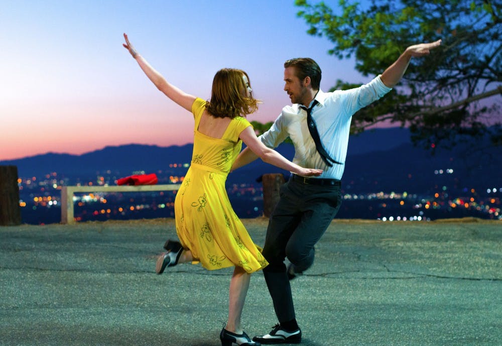 Ryan Gosling as Sebastian and Emma Stone as Mia in a scene from the movie "La La Land," which was nominated for a record-tying 14 Oscars. (Dale Robinette/Lionsgate/TNS)