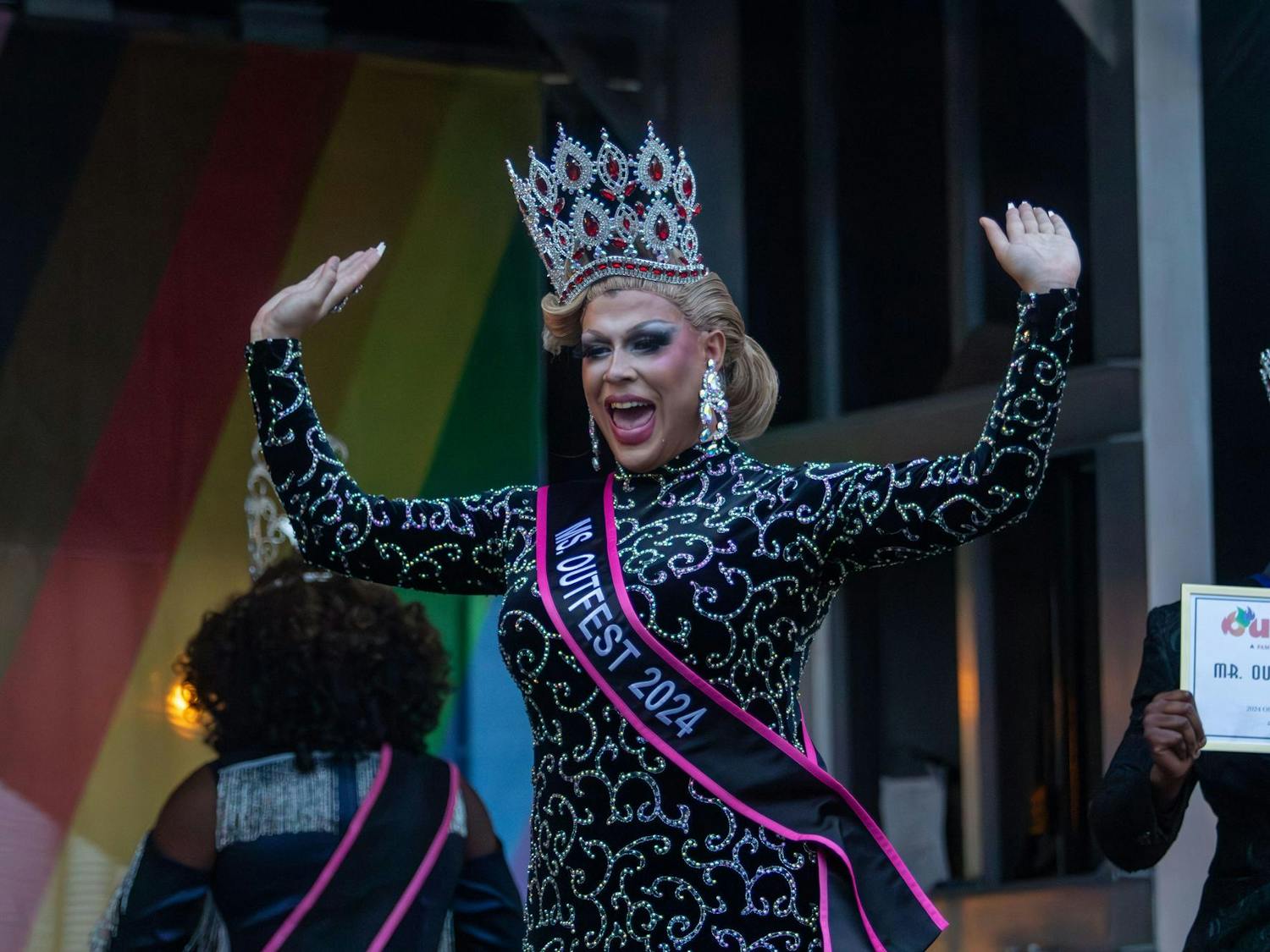 Drag performer Colbi J with her hands raised after winning Ms. Outfest 2024 on June 1, 2024. Outfest, hosted by South Carolina Pride, also has a drag pageant with three different titles to win: Mr., Ms., and Mx.