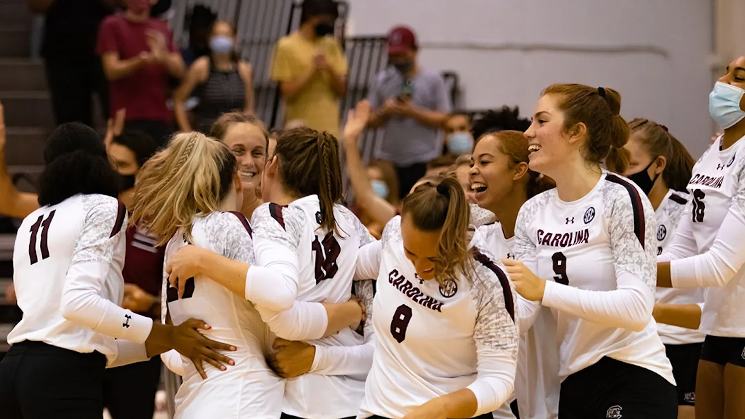 The Gamecock Volleyball team celebrates Freshman Emmy Rollins first collegiate career kill. Rollins earned the game winning point completing a three-set sweep over the High Point Panthers. 