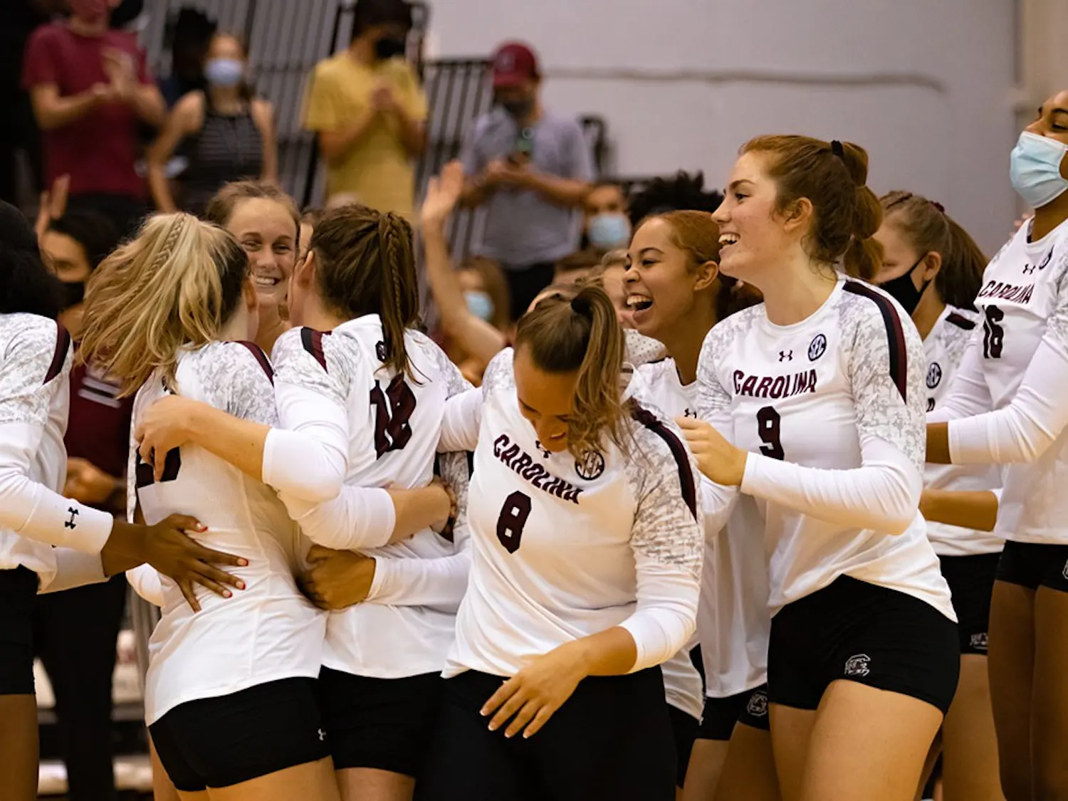 The Gamecock Volleyball team celebrates Freshman Emmy Rollins first collegiate career kill. Rollins earned the game winning point completing a three-set sweep over the High Point Panthers. 