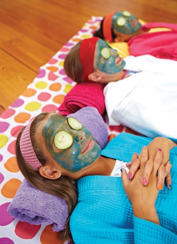 Have guests paint each other's faces with a homemade facial mask - then relax with some cooling cucumber slices resting on guests' eyes. (Ronnie Andren/FamilyFun Magazine/MCT)
