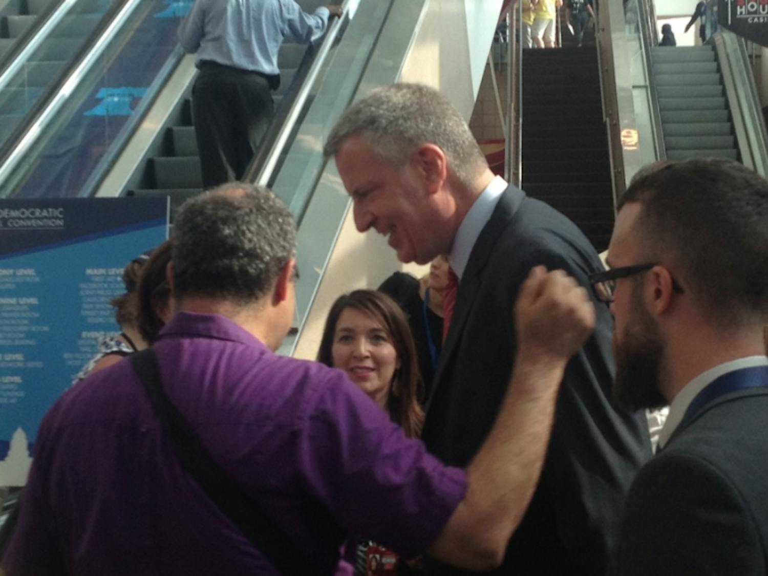 New York Mayor Bill de Blasio greets delegates on the first day of the Democratic National Convention in Philadelphia on July 25, 2016.