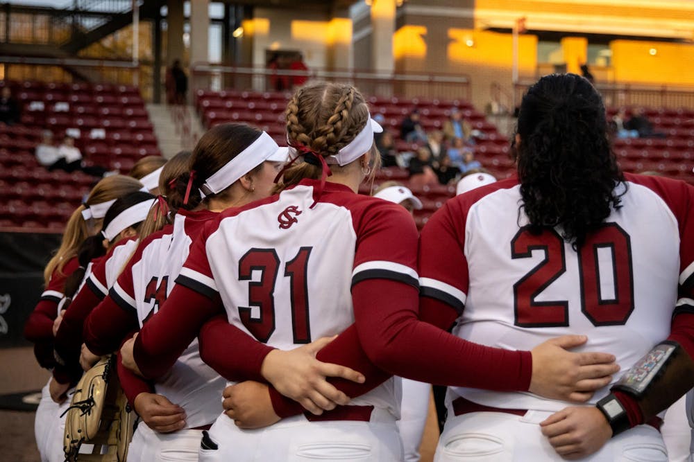 <p>FILE — University of South Carolina softball players embrace each other during pregame festivities at Beckham Field on Feb. 19, 2025. The Gamecocks are 22-5 on the season and started the season with 20 straight wins.</p>