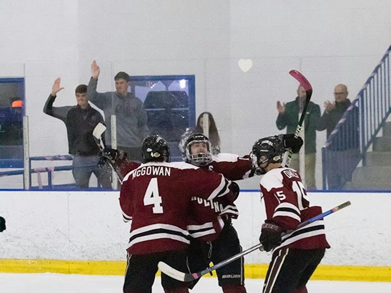 South Carolina club hockey players celebrate a goal. 