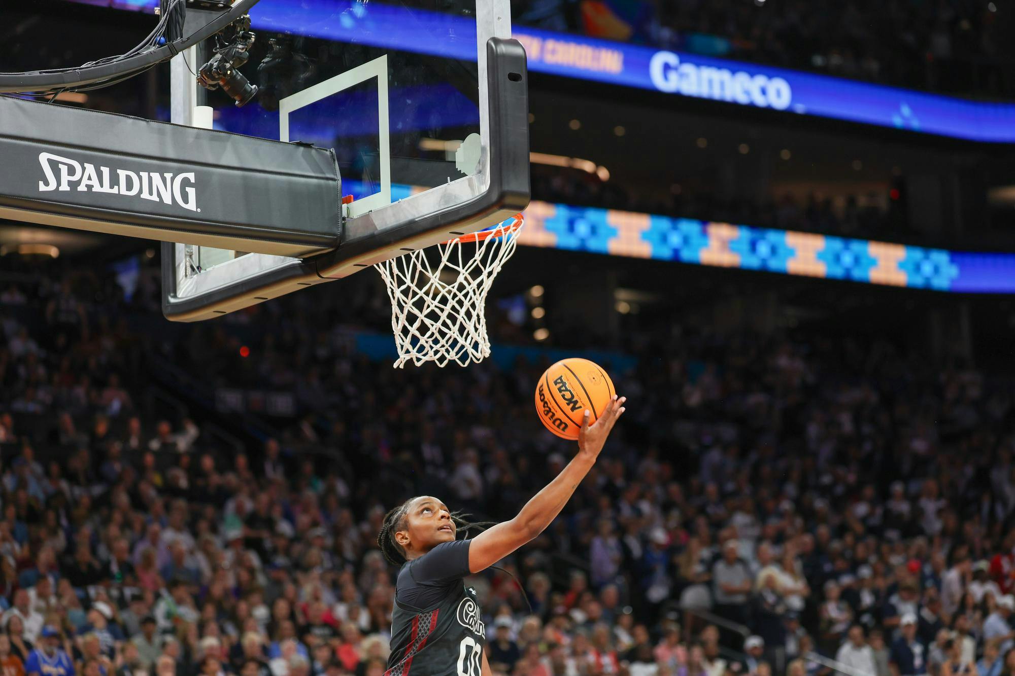 Senior guard Ta'Niya Latson shoots a layup during the semifinal game against UConn on April 3, 2026. Latson scored 16 points, the most of the team.