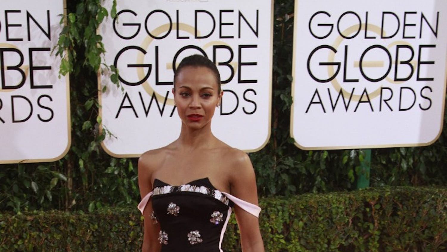 Zoe Saldana arrives for the 71st Annual Golden Globe Awards show at the Beverly Hilton Hotel on Sunday, Jan. 12, 2014, in Beverly Hills, Calif. (Kirk McKoy/Los Angeles Times/MCT)