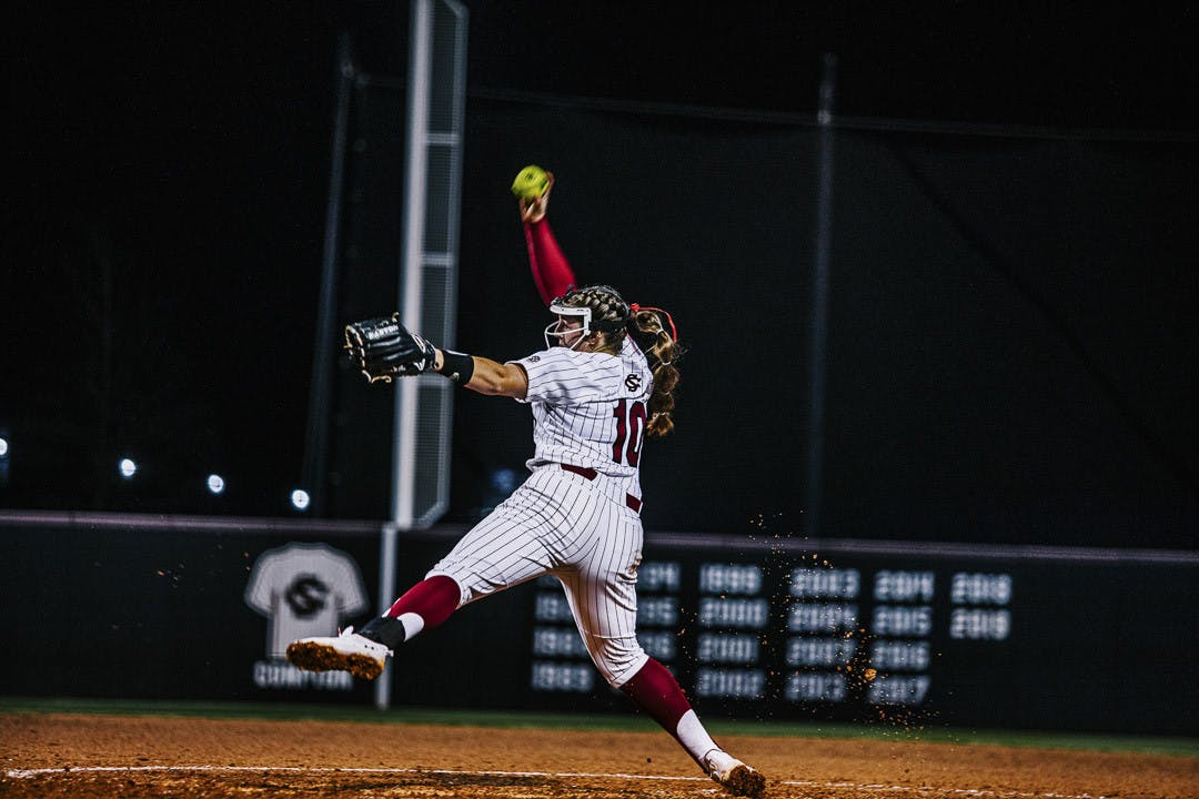 Senior pitcher Bailey Betenbaugh winds up to throw her first pitch of the home opener against the College of Charleston at Carolina Softball Stadium at Beckham Field on February 15, 2023. The Gamecocks beat the Cougars 8-0.&nbsp;