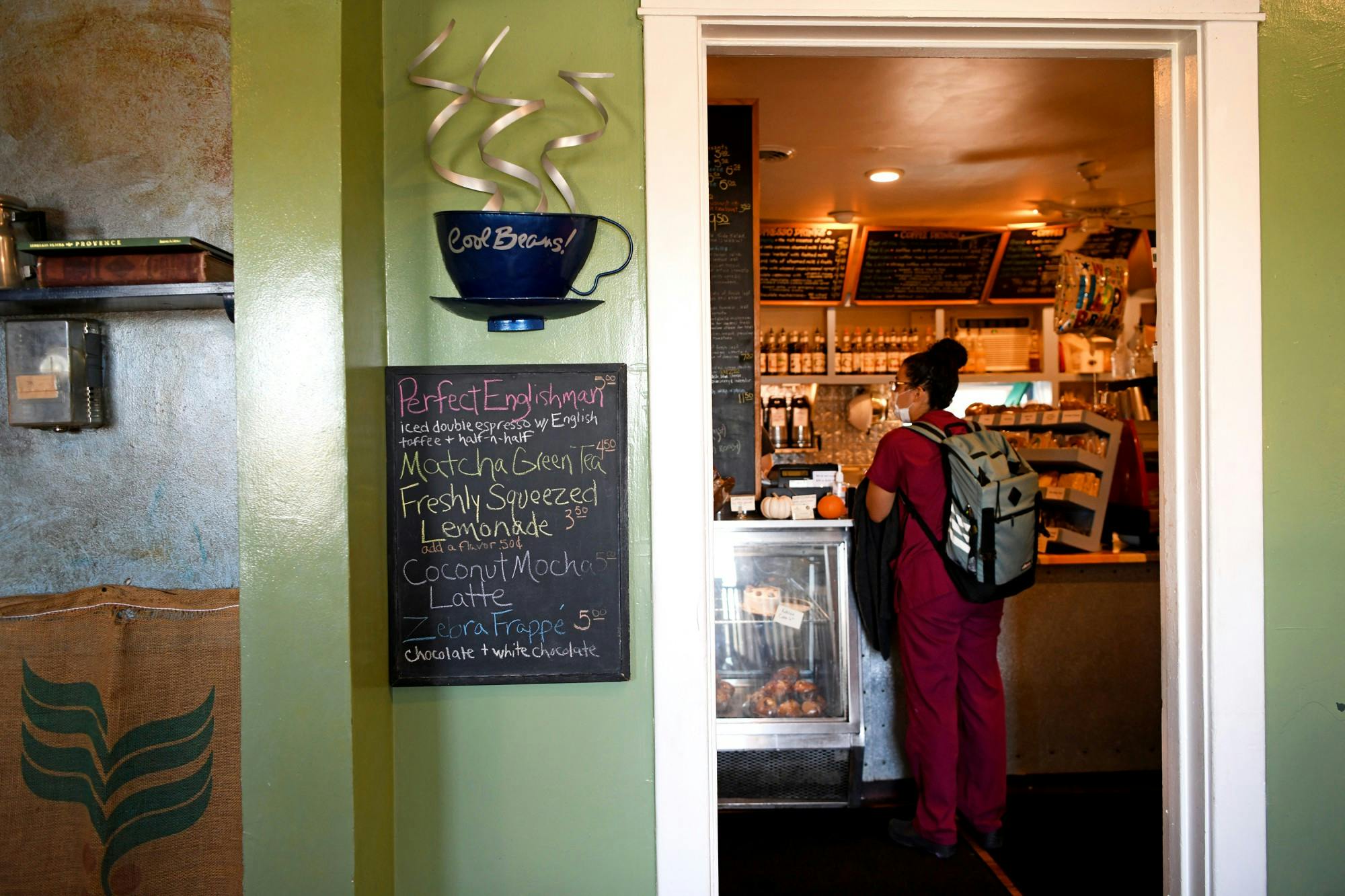Specials are written on a chalkboard right outside the register at Cool Beans Coffee Co. These drinks change often and range from lemonades to espresso drinks.