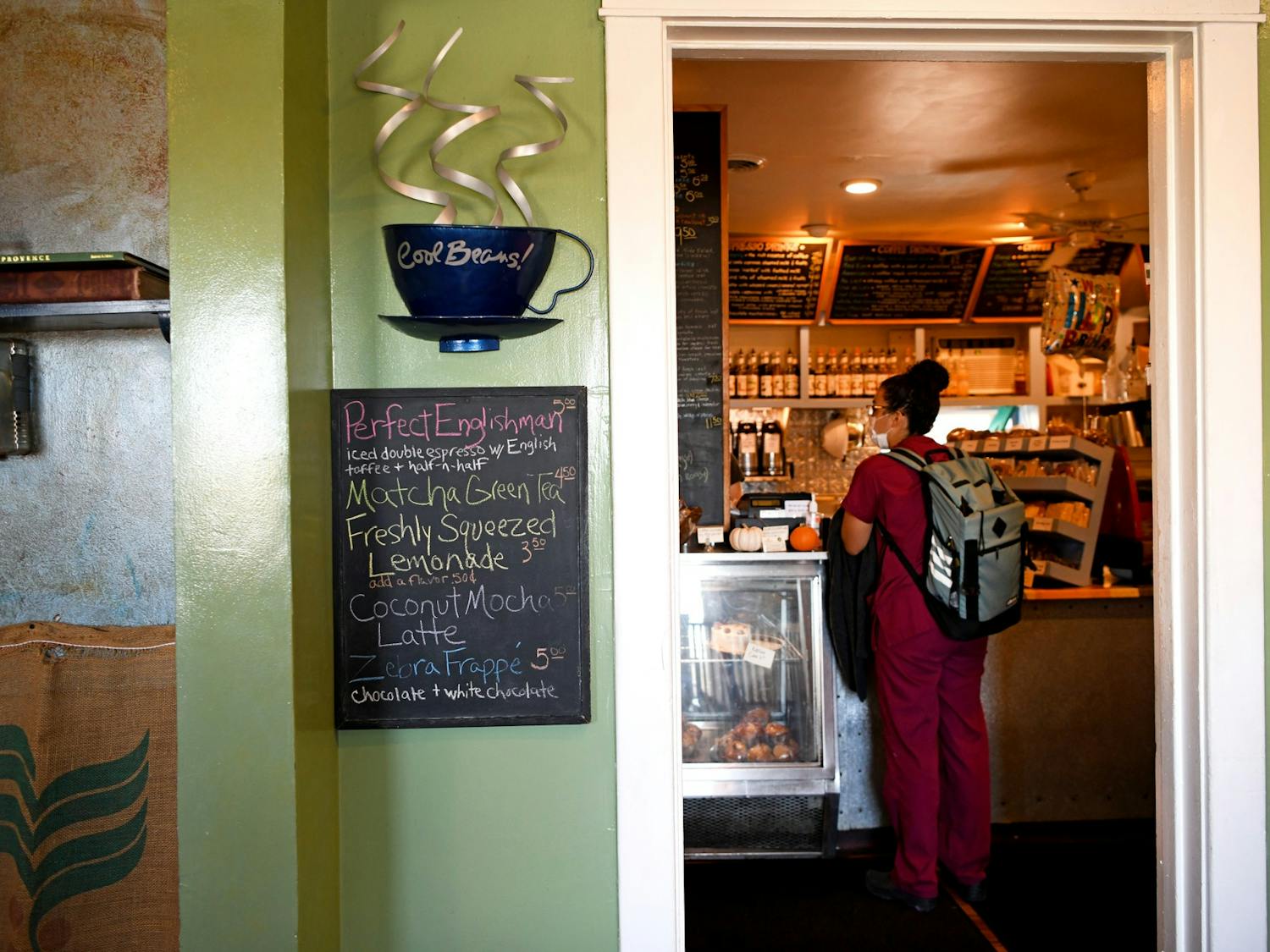 Specials are written on a chalkboard right outside the register at Cool Beans Coffee Co. These drinks change often and range from lemonades to espresso drinks.