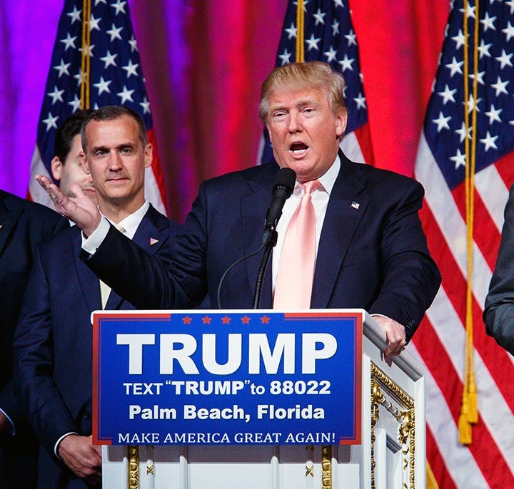 Corey Lewandowski, left, Donald Trump&apos;s campaign manager, stands beside Trump on March 15, 2016 at a campaign event in Florida. As of Monday, June 20, 2016, Lewandowski is no onger working with the campaign.  (Richard Graulich/The Palm Beach Post/Zuma Press/TNS) 