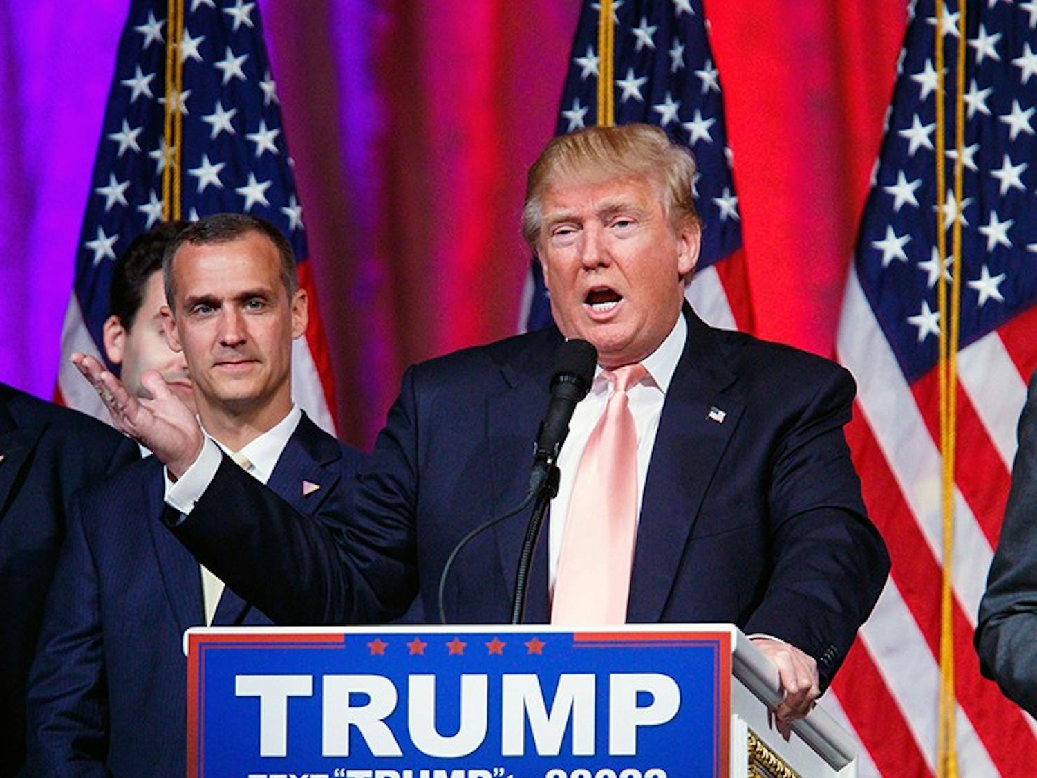 Corey Lewandowski, left, Donald Trump&apos;s campaign manager, stands beside Trump on March 15, 2016 at a campaign event in Florida. As of Monday, June 20, 2016, Lewandowski is no onger working with the campaign.  (Richard Graulich/The Palm Beach Post/Zuma Press/TNS) 