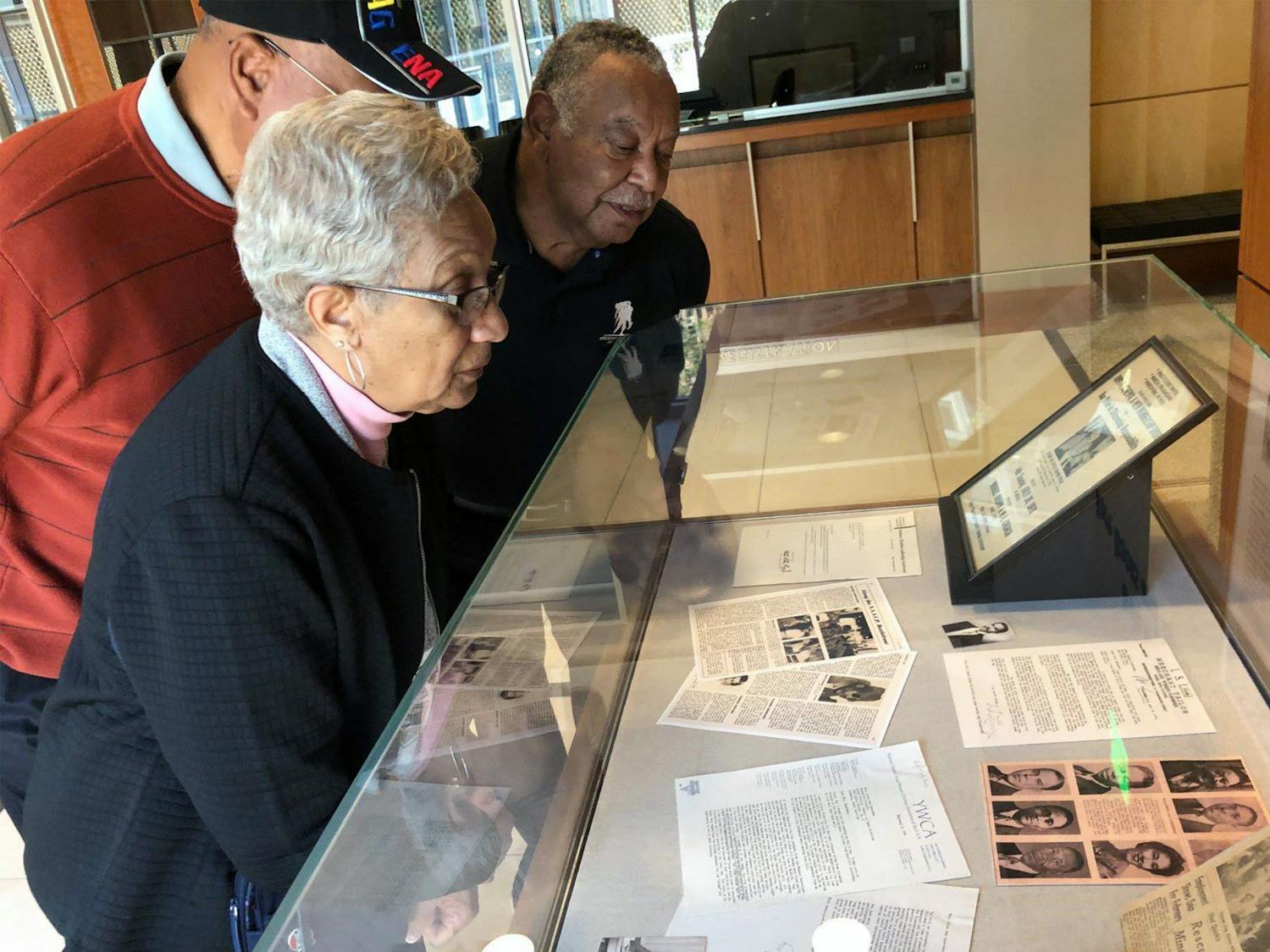 Descendants of voting rights activist George Elmore view a section of the Justice for All exhibit. The civil rights exhibit can be found in the Ernest F. Hollings Special Collections Library within Thomas Cooper Library until March 2022.