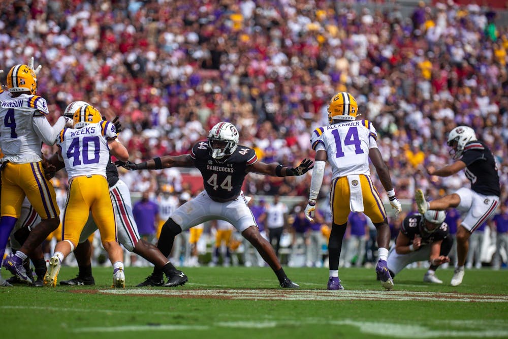 <p>Sophomore tight end Maurice Brown II defends against Louisiana State University players at Williams Brice Stadium on Sept. 14, 2024. Brown is the third member of the Gamecocks football team to be put on scholarship in the month of September.</p>