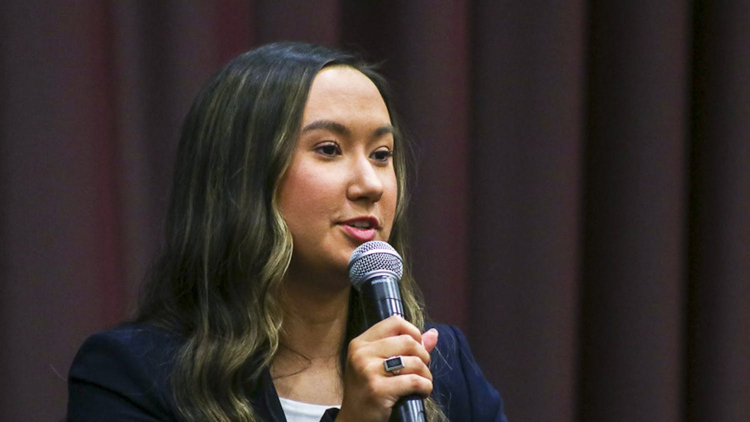 Student Body President-elect Emily “Emmie” Thompson answers a question at the Student Government debate on Feb. 15, 2023. She promoted her campaign by advertising “tangible” goals and promises.&nbsp;