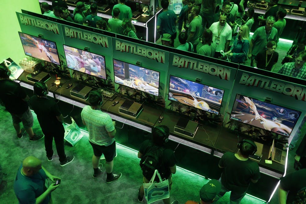 A large crowd of video game enthusiasts fill the Xbox game booth to try out new games during the first day of three-day E3 Electronic Entertainment Expo., annual video game conference and show at the Los Angeles Convention Center on June 16, 2015 in Los Angeles. (Allen J. Schaben/Los Angeles Times/TNS)
