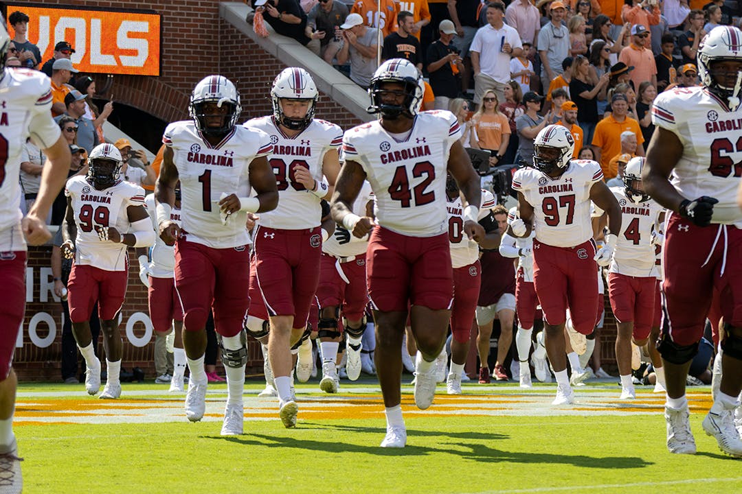 The Gamecocks run out onto the field of Neyland Stadium before facing off the Volunteers on Oct. 9, 2021.
