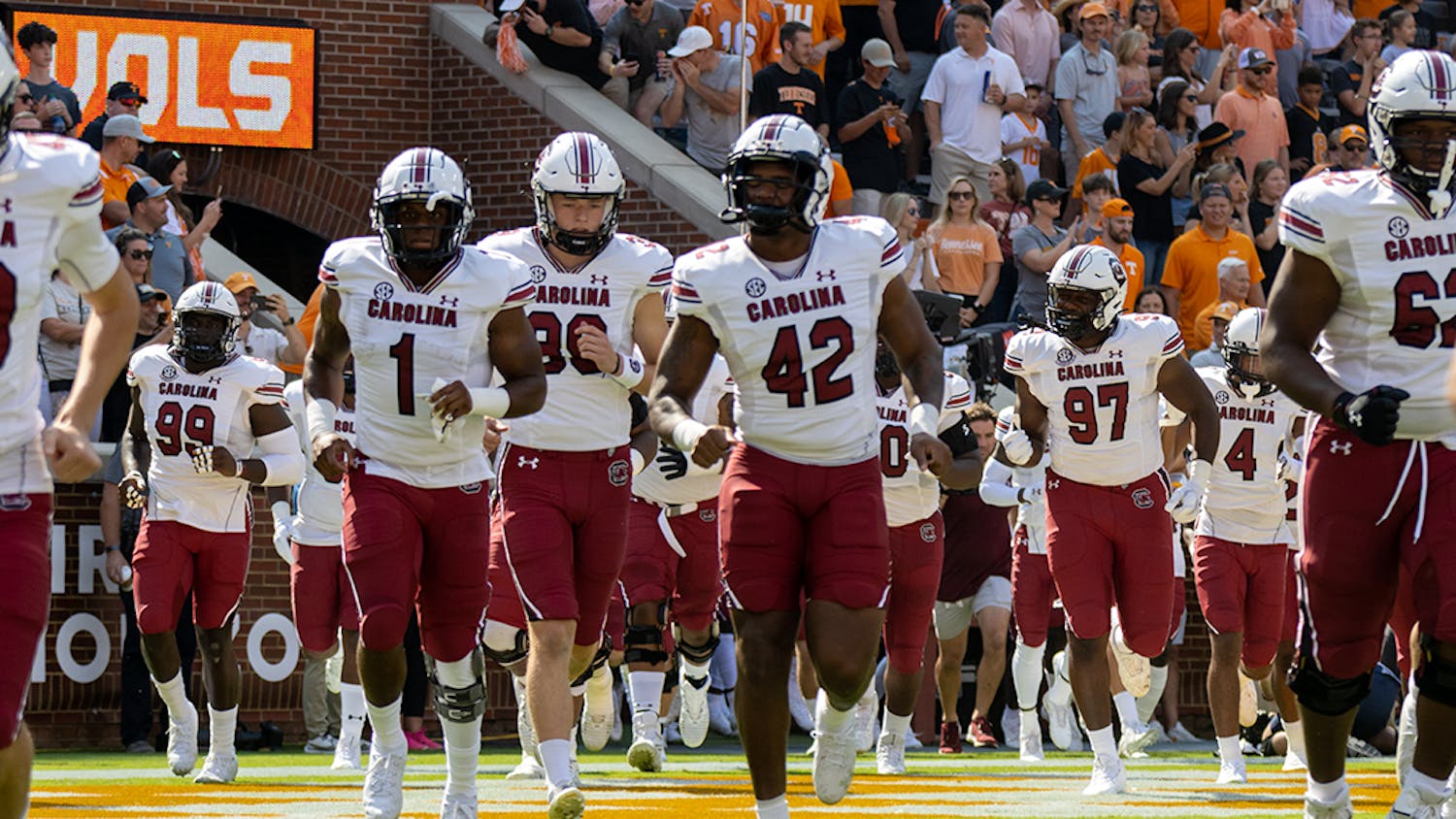 The Gamecocks run out onto the field of Neyland Stadium before facing off the Volunteers on Oct. 9, 2021.

