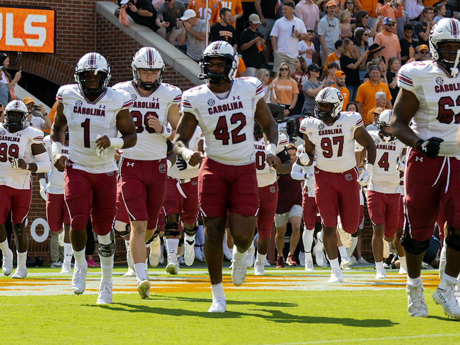 The Gamecocks run out onto the field of Neyland Stadium before facing off the Volunteers on Oct. 9, 2021.
