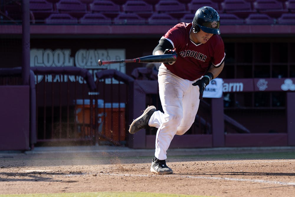 <p>Missouri transfer Brandt Belk bats a ball out in left field taking him to first base. The Gamecocks won the second game 8-4 against UNCW.</p>