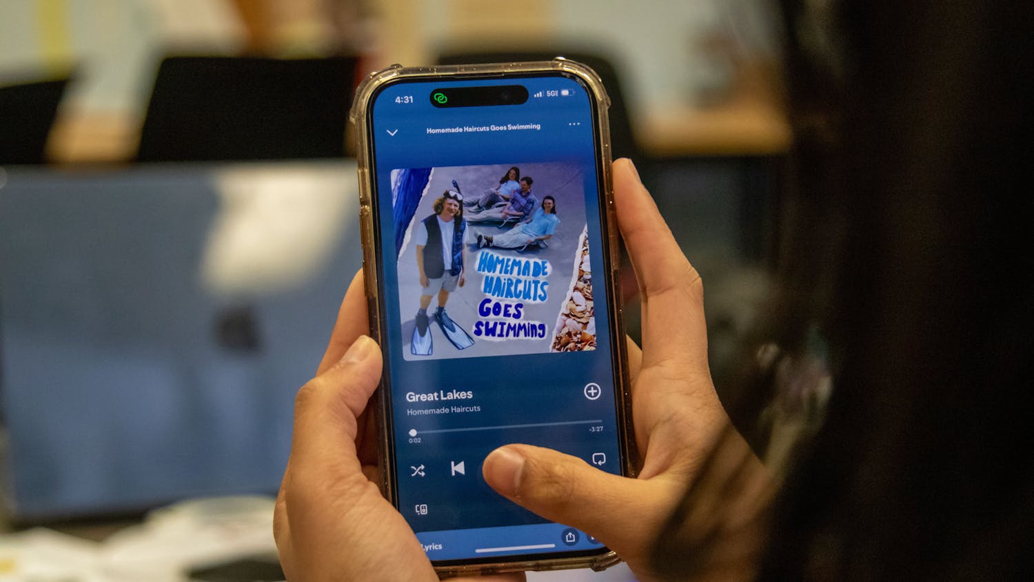 A photo illustration of the Homemade Haircuts EP on a phone on Sept. 5, 2024. Homemade Haircuts is a local Columbia band.