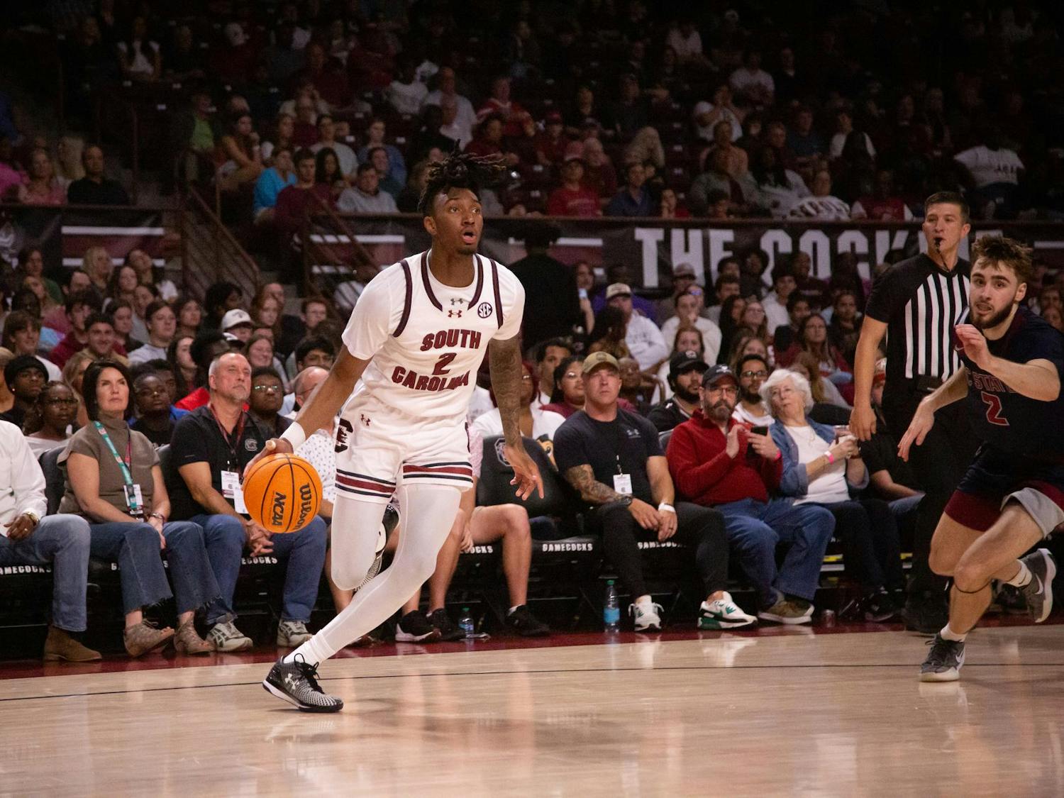 Junior guard Zachary Davis dribbles the ball to the basket on Nov. 8, 2024 as the University of South Carolina faces South Carolina State University at Colonial Life Arena. Davis came off the bench and played 28 minutes for the Gamecocks.