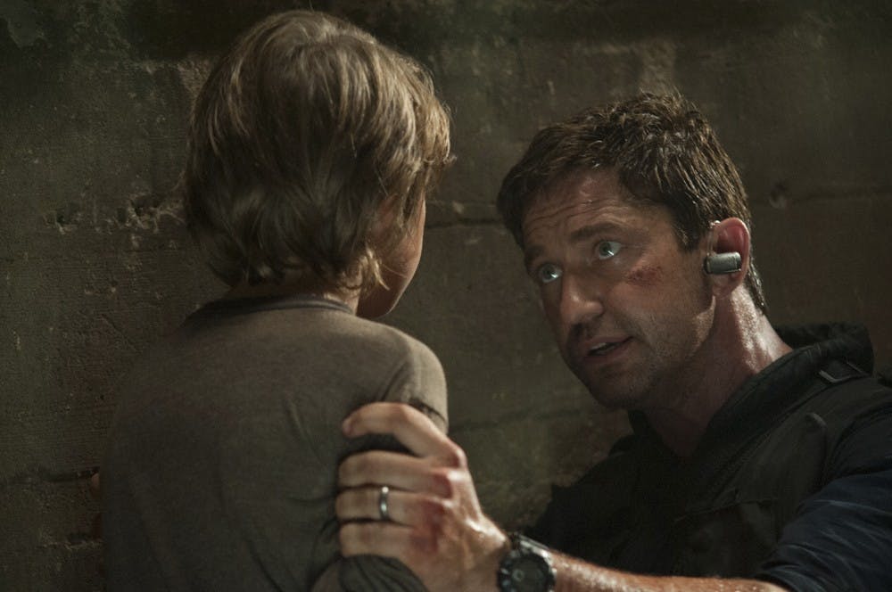 Finley Jacobsen, left, and Gerard Buter star in &quot;Olympus Has Fallen.&quot; (Phil Caruso/FilmDistrict/MCT)