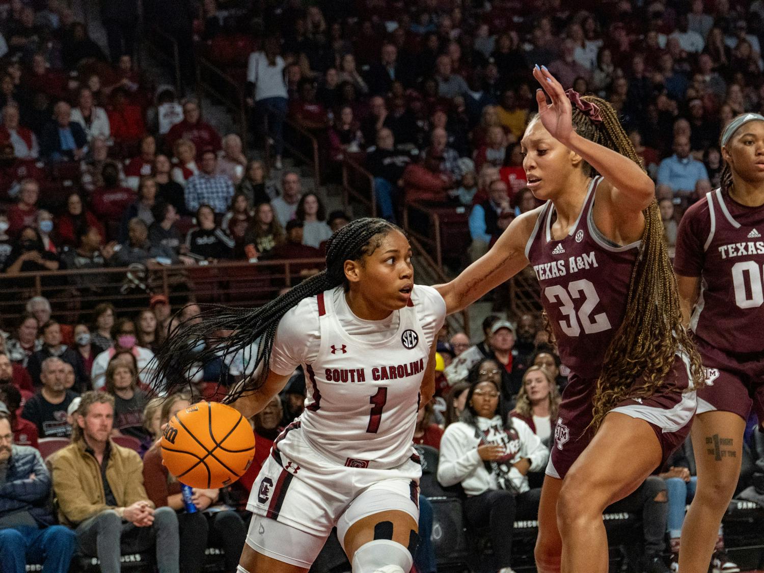 Senior guard Zia Cooke moves around her opponent during a lay-up attempt in a game against Texas A&amp;M at Colonial Life Arena on Dec. 29. 2022. South Carolina defeated Texas 76-34 in its SEC-opener.&nbsp;