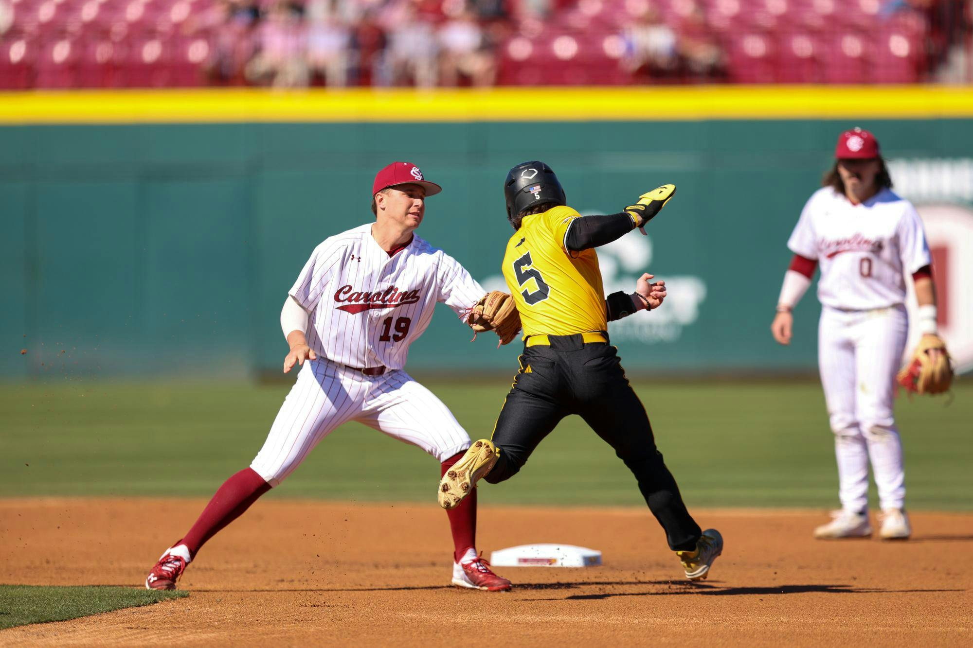 Sophomore infielder KJ Scobey tags out an opposing player during the game against Northern Kentucky on Feb. 13, 2026. Scobey recorded two putouts.