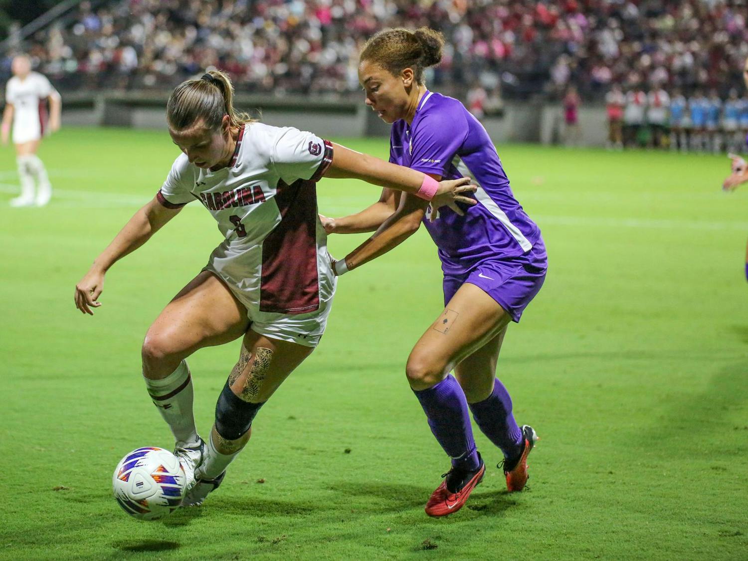 Senior defender Hallie Meadows fends off an opponent during South Carolina’s match against LSU at Stone Stadium on Oct. 5, 2023. The Gamecocks beat the Tigers 1-0.