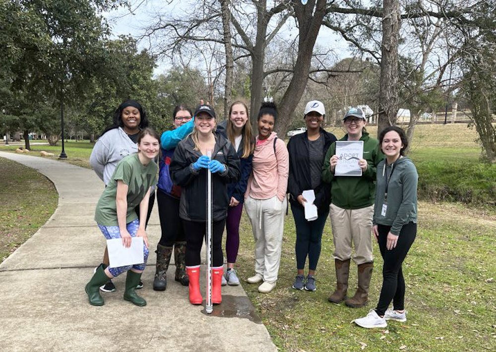 <p>Members of the South Carolina section of the American Water Works Association and the Water Environment Association, also known as "Water Club," gather together after their Adopt a River cleanup on Feb. 18, 2023. The club promotes environmental education through clean-ups and water quality testing.&nbsp;</p>