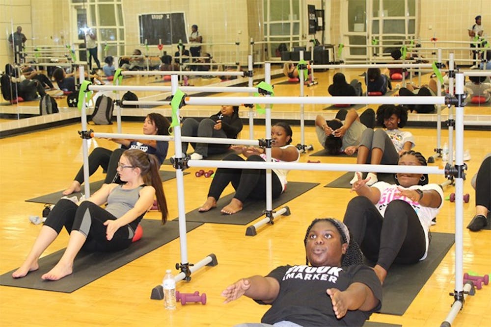 <p>Members of USC's PRETTY GIRLS SWEAT chapter exercise in Strom Thurmond Wellness and Fitness Center. The members use a variety of equipment during their sessions.</p>