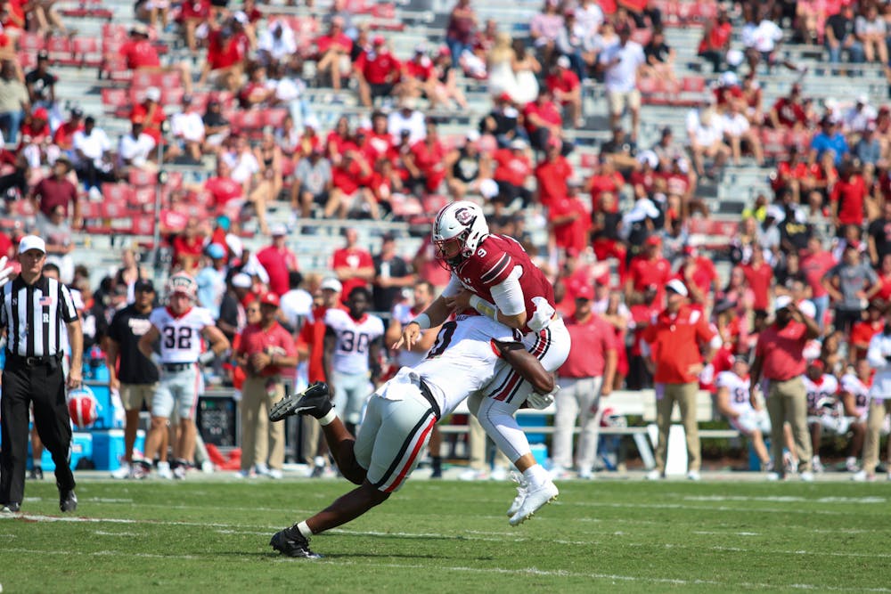 Luke Doty throws a devastating interception in the Gamecock's most promising drive during the final quarter of their game against the no. 1 Georgia Bulldogs on Sep. 17, 2022.