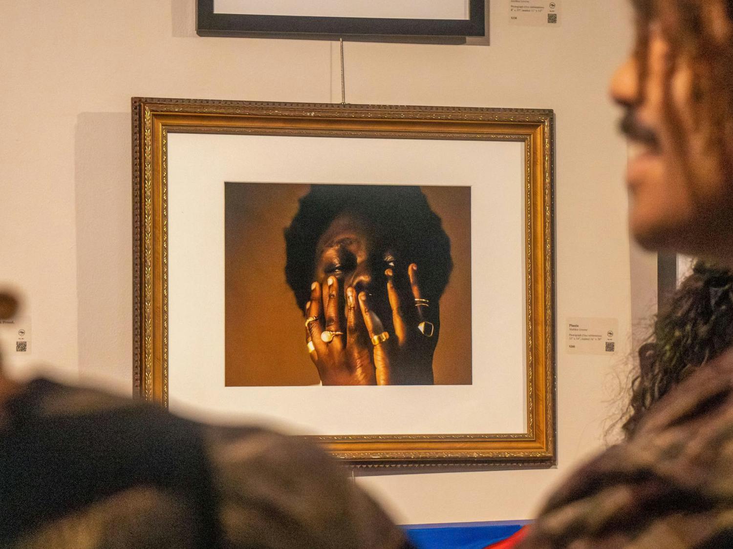 An art piece, titled "Plastic," is on display in the Koger Center on Oct. 17, 2024. The exhibit highlights local LGBTQIA+ artists as part of the museum's annual celebration.