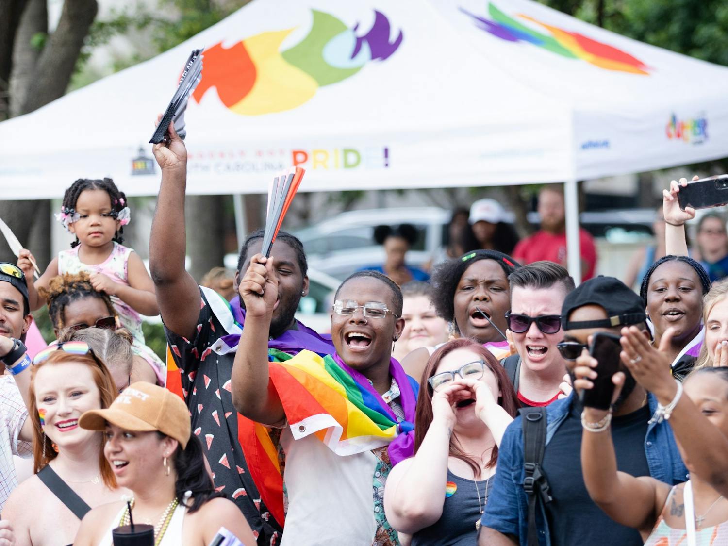 The crowd cheers as Outfest attendees enter a spontaneous dance circle on Park Street on June 4, 2022. Outfest featured performances, food and vendors in honor of Pride month.