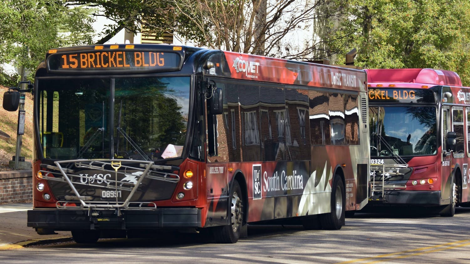 Central Midlands Regional Transit Authority (COMET) shuttles parked at the Greene Street transit stop. Taking the shuttle is one of many ways that individuals can tackle rising carbon emissions and its adverse effects on the South Carolina climate. &nbsp;