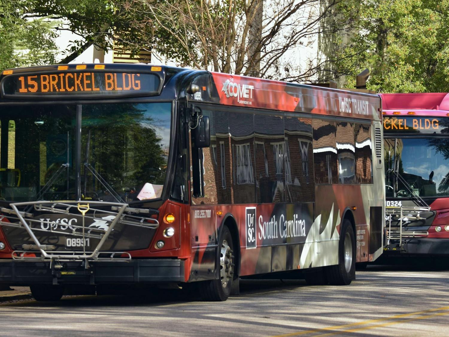 Central Midlands Regional Transit Authority (COMET) shuttles parked at the Greene Street transit stop. Taking the shuttle is one of many ways that individuals can tackle rising carbon emissions and its adverse effects on the South Carolina climate. 