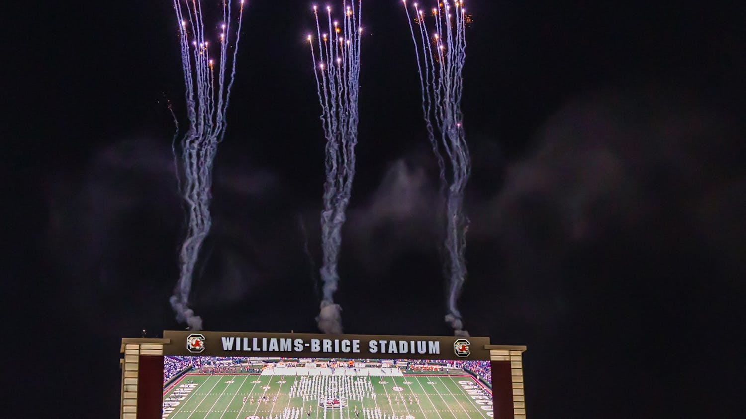 Fireworks go off at the Williams Brice Stadium as the Gamecock players enter the field to play against the Clemson Tigers on November 27, 2021. 