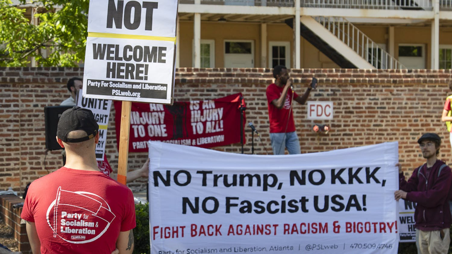 Protesters hold up anti-fascism signs at the Party for Socialism and Liberation rally on April 12, 2023. The rally focused on outreach for PSL while advocating against capitalism and war spending.
