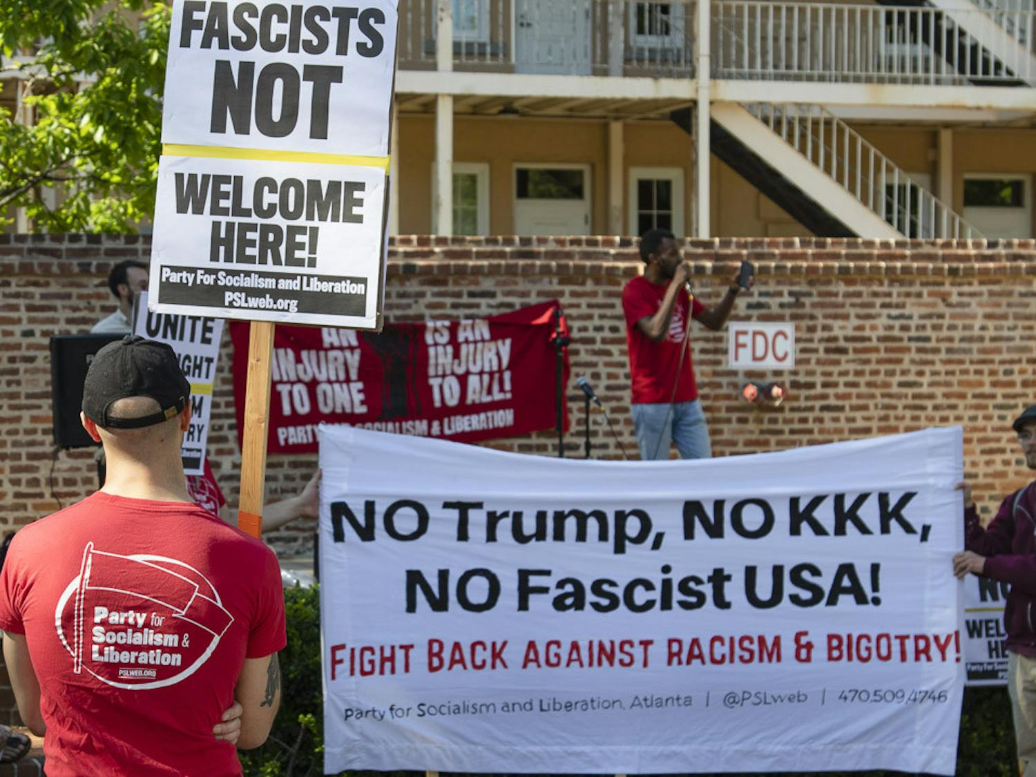 Protesters hold up anti-fascism signs at the Party for Socialism and Liberation rally on April 12, 2023. The rally focused on outreach for PSL while advocating against capitalism and war spending.