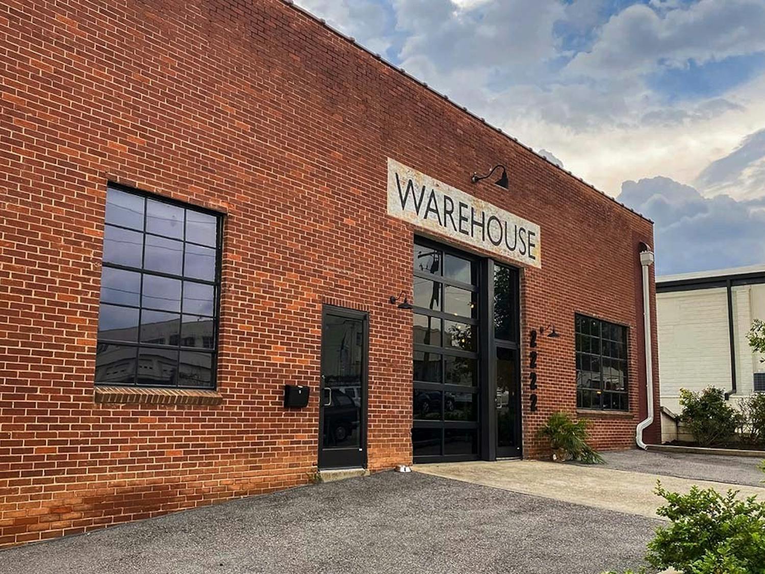 The storefront of NoMa Warehouse, a place for creatives to gather and work on their projects. The workspace and clothing store was founded by Mazie Cook and Beth Lawson, who gained inspiration from Warhol's "The Factory." 