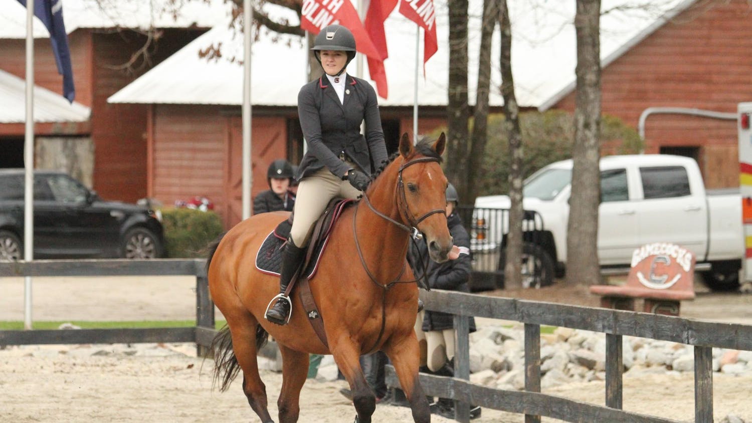 FILE — Senior Madeline Schaefer mounted on Tanner competes in the fences category during the meet against Texas A&M at One Wood Farm on Feb. 11, 2023. Of the horses that she competed on during her time at Carolina, two are in the top Schaefer’s list of favorites.