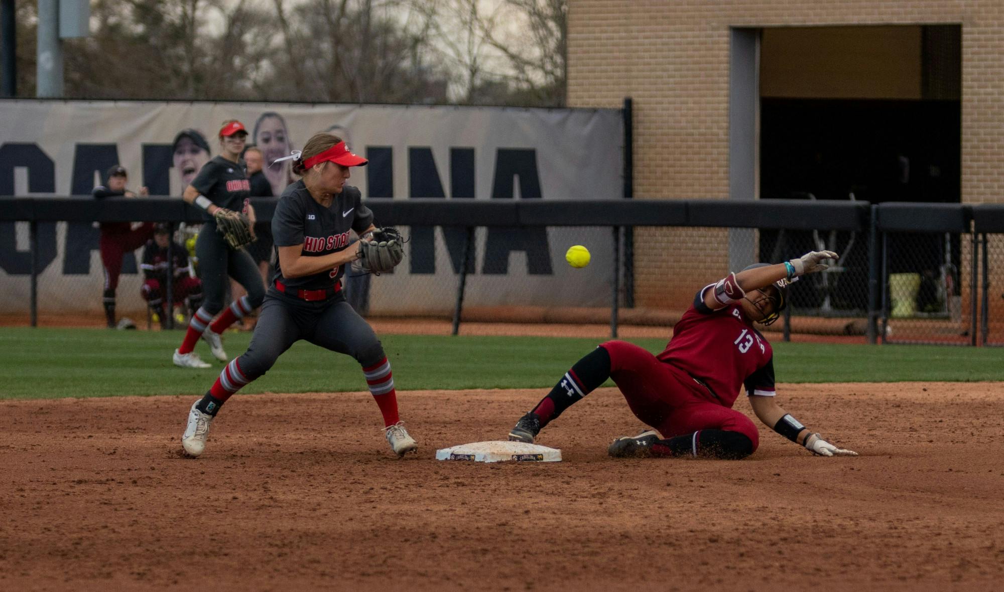 Sophomore Infielder Zoe Laneaux slides into second base after hitting a double in the bottom of the fifth inning against Ohio State on Feb. 26, 2022, at Beckham Field. Carolina lost in their third game of the Carolina Classic against Ohio State 6-2.&nbsp;