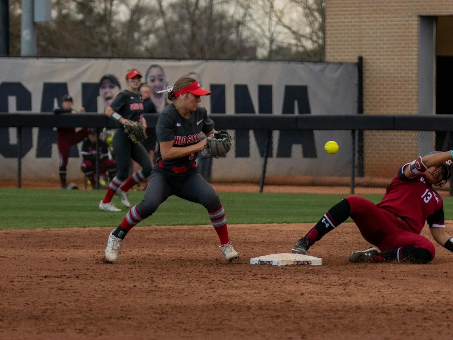 Sophomore Infielder Zoe Laneaux slides into second base after hitting a double in the bottom of the fifth inning against Ohio State on Feb. 26, 2022, at Beckham Field. Carolina lost in their third game of the Carolina Classic against Ohio State 6-2.&nbsp;