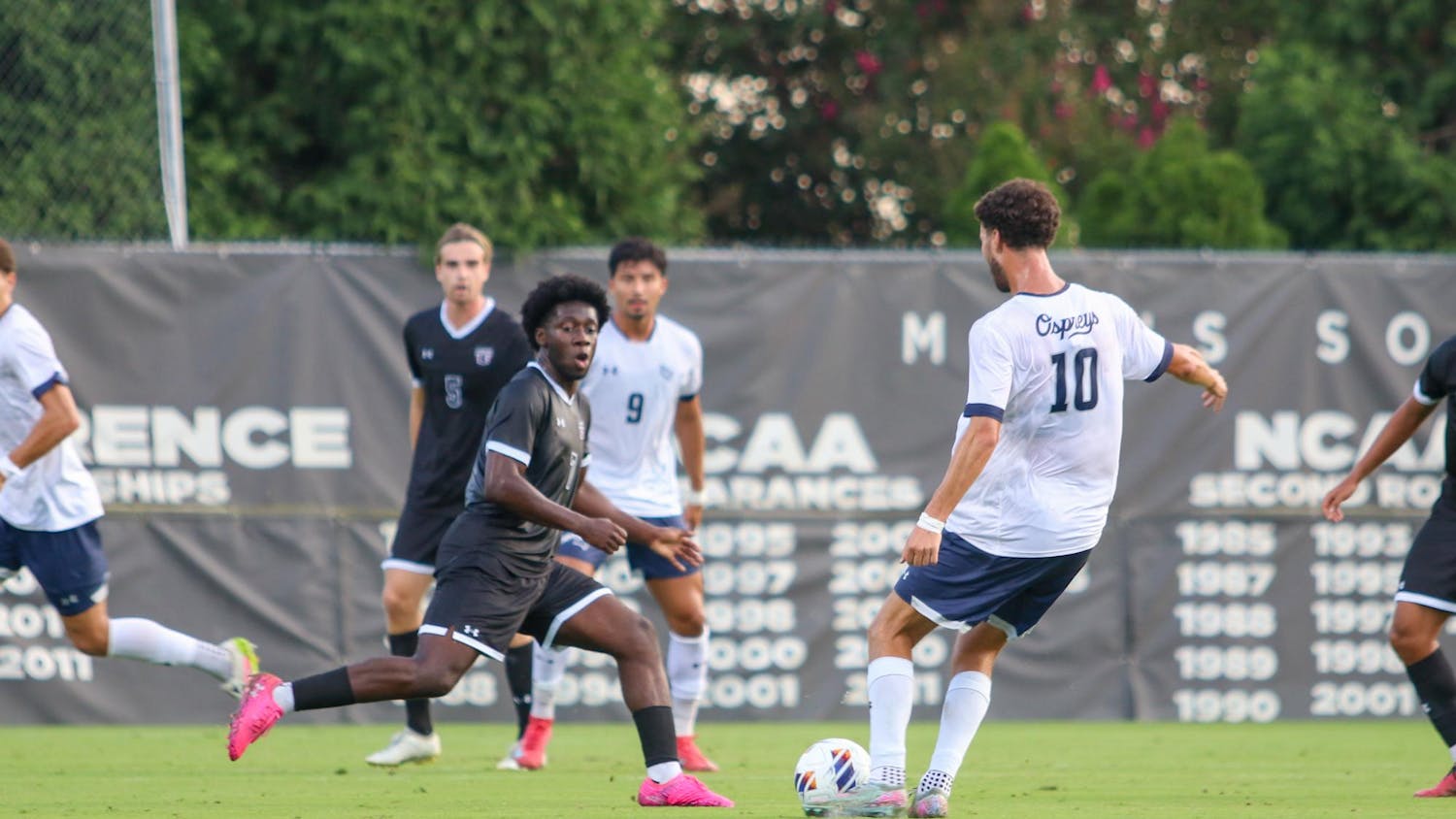 Junior midfielder Isaiah Whittaker-Francis (center, pink cleats) playing defense against North Florida on Sept. 16, 2025 at Stone Stadium. The Gamecocks lost to the Ospreys 2-0.