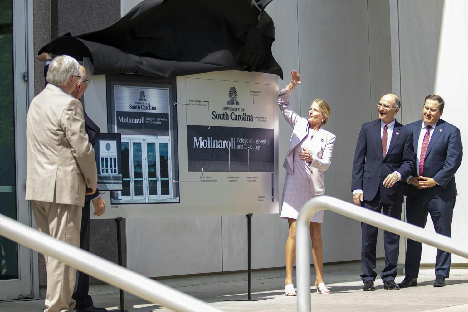 Alex Molinaroli, Kristin Ihle Molinaroli, Michael Amiridis and others unveiled the new name and banner for the USC Molinaroli College of Engineering and Computing on June 6, 2024. The USC Board of Trustees approved a $30 million donation from Alex Molinaroli, a USC alumnus.