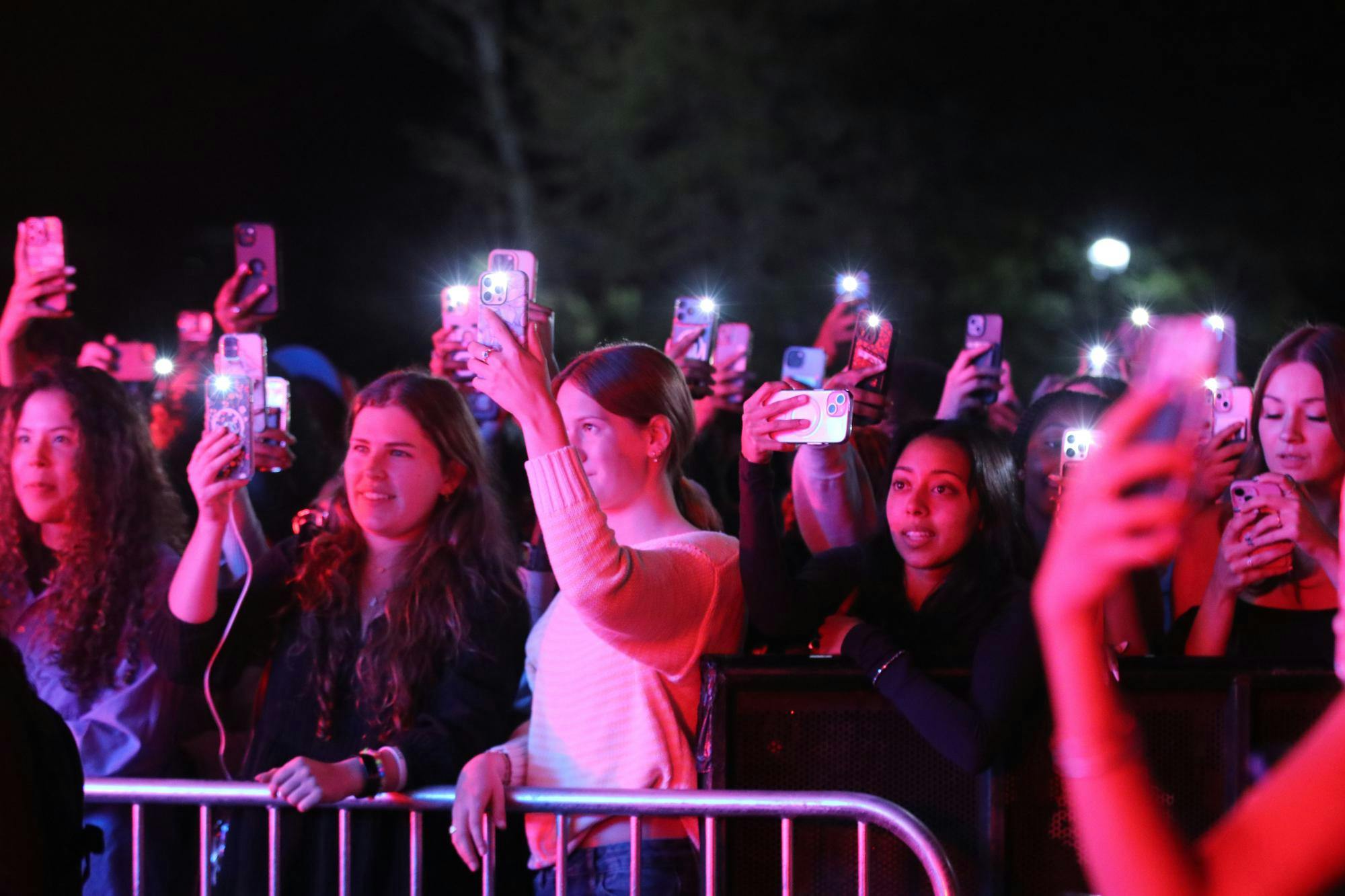 University of South Carolina students wave their phones in the air to welcome Luh Tyler onto the Cockstock stage on March 24, 2026, at Blatt Field. Luh Tyler was the third and final performer in Cockstock.