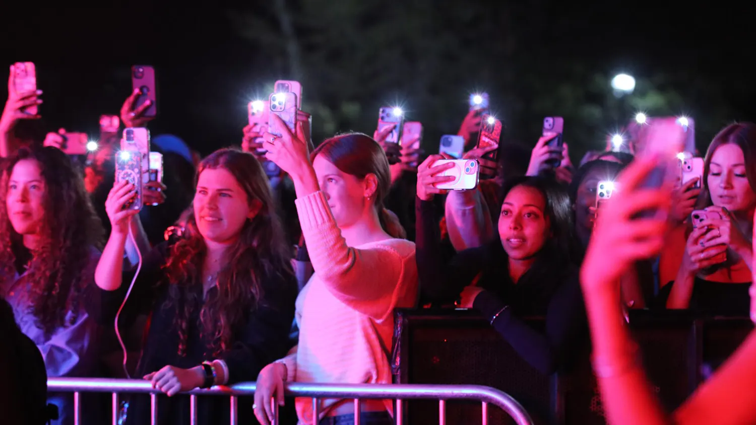 University of South Carolina students wave their phones in the air to welcome Luh Tyler onto the Cockstock stage on March 24, 2026, at Blatt Field. Luh Tyler was the third and final performer in Cockstock.
