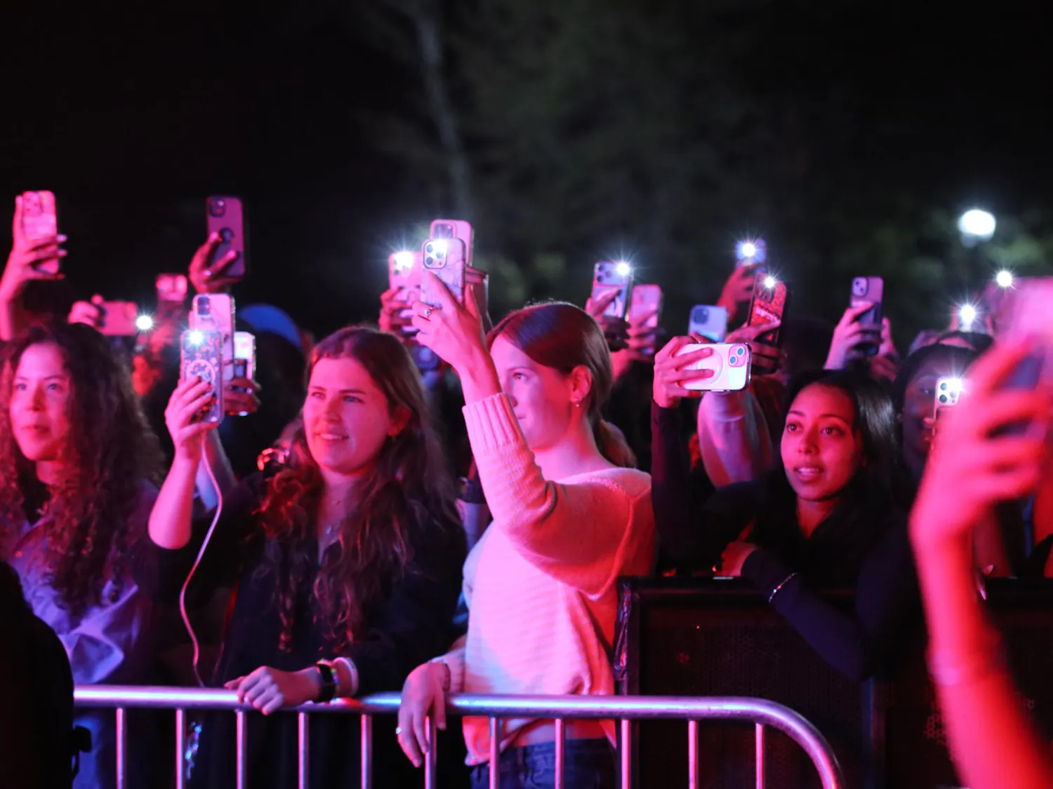University of South Carolina students wave their phones in the air to welcome Luh Tyler onto the Cockstock stage on March 24, 2026, at Blatt Field. Luh Tyler was the third and final performer in Cockstock.